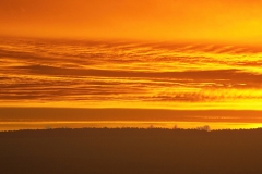 Sonnenaufgang, gegenüber der Regenbogen